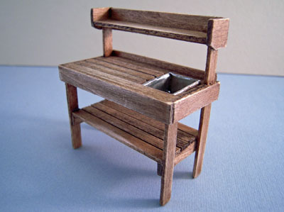 1/2" scale antique walnut potting bench