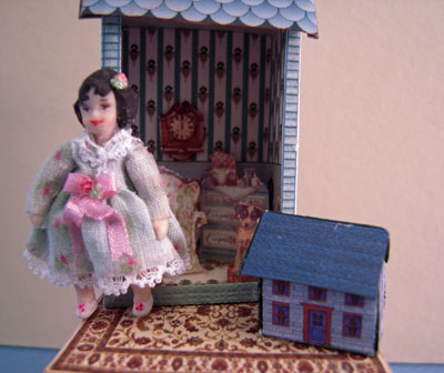 1" scale loretta kasza hand crafted dollhouse on a table blue 1" scale loretta kasza hand crafted dollhouse on a table blue