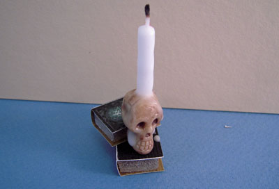 Taylor Jade Creepy Skull Candle On Books 1:12 scale